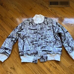 Reversible men’s Nike jacket, white on one side and graphic on the other